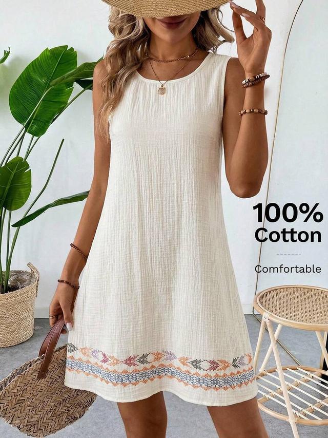 white cotton gauze sleeveless shift dress with embroidery