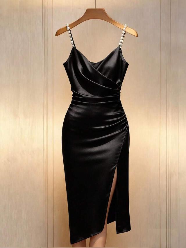 elegant black satin bodycon dress with pearl strap detail
