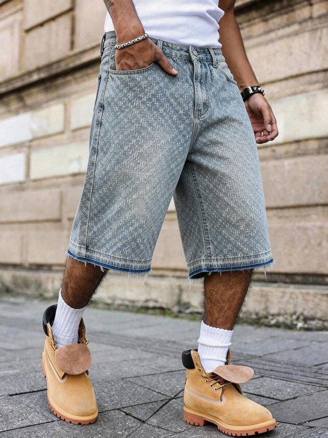 textured washed denim shorts with raw hem
