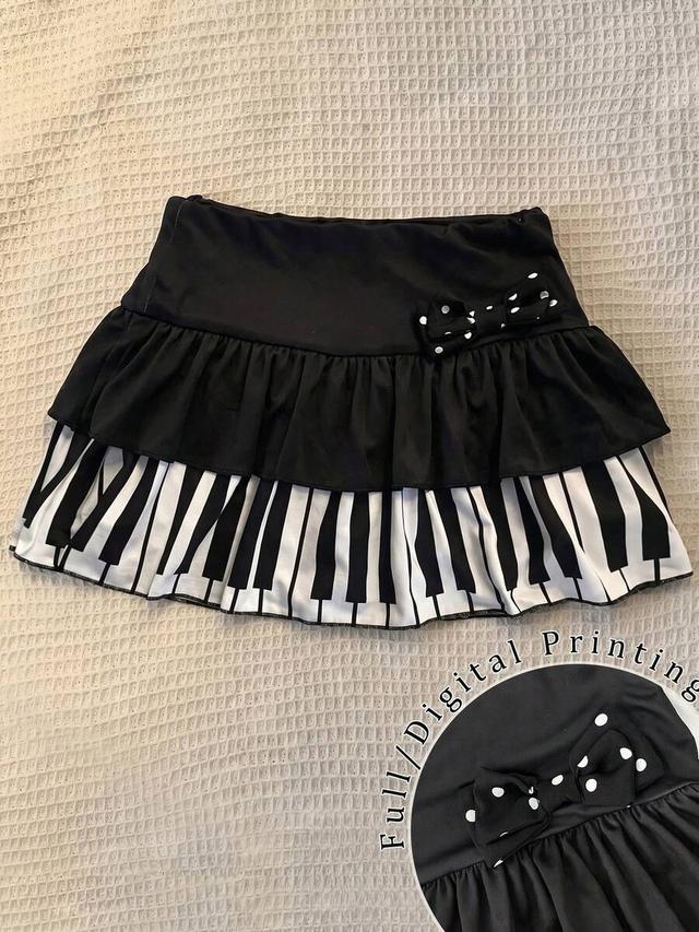 polka dot bow ruffle mini skirt with piano print