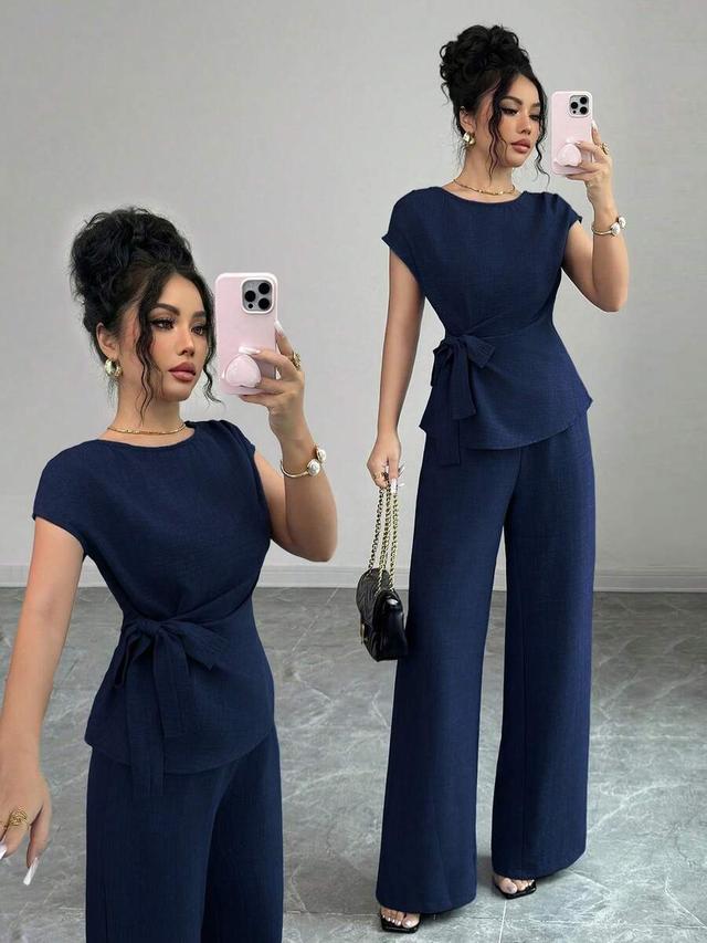 navy blue wide leg trousers with cinched waist