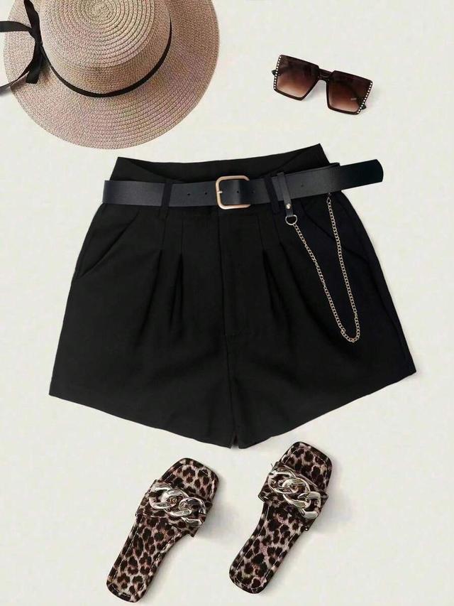 black pleated belted shorts with chain detail