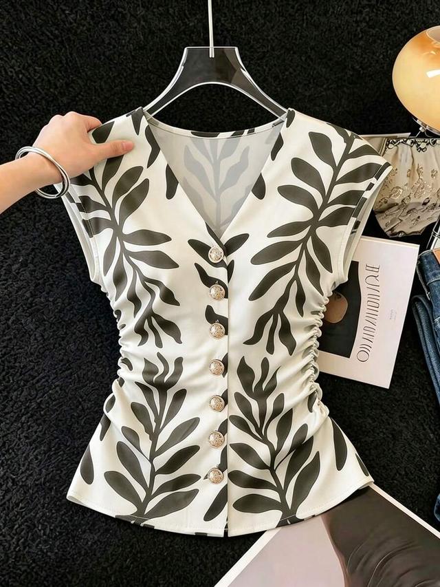 v-neck button-down blouse with pleated waist