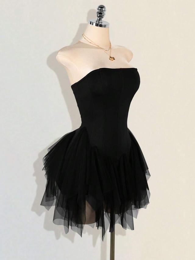 black strapless corset dress with layered tulle skirt