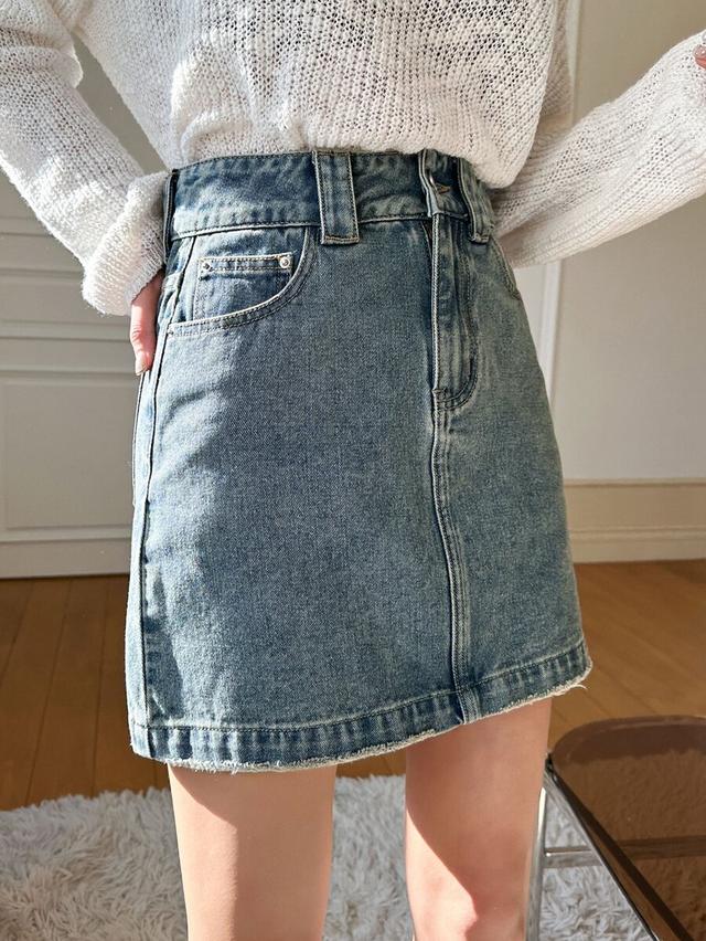 casual blue denim mini skirt with raw hem