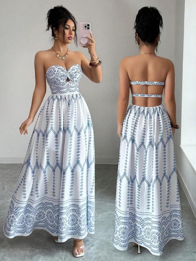 strapless white cotton dress with blue embroidered patterns