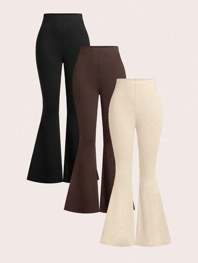 black fitted elastic waist flare trousers