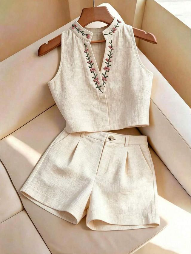 embroidered sleeveless top and pleated shorts set