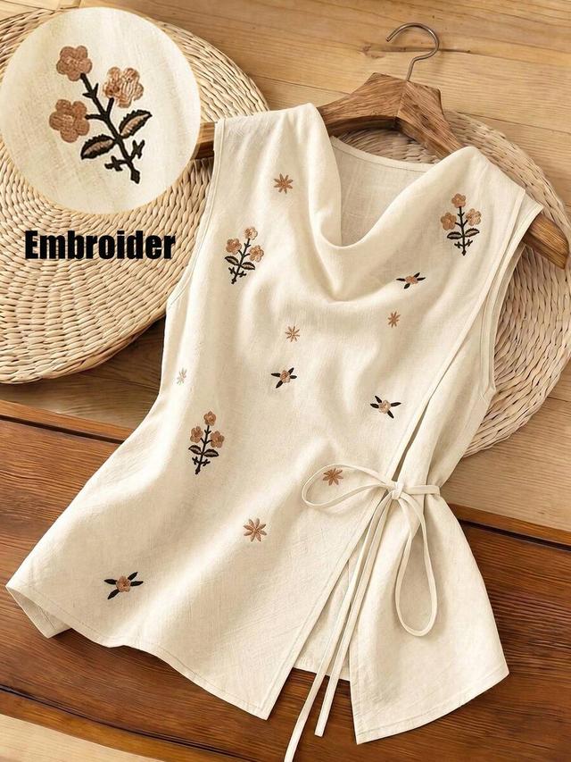 beige sleeveless floral embroidered tie front top