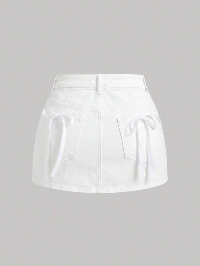 white denim mini skirt with ribbon bow detailing
