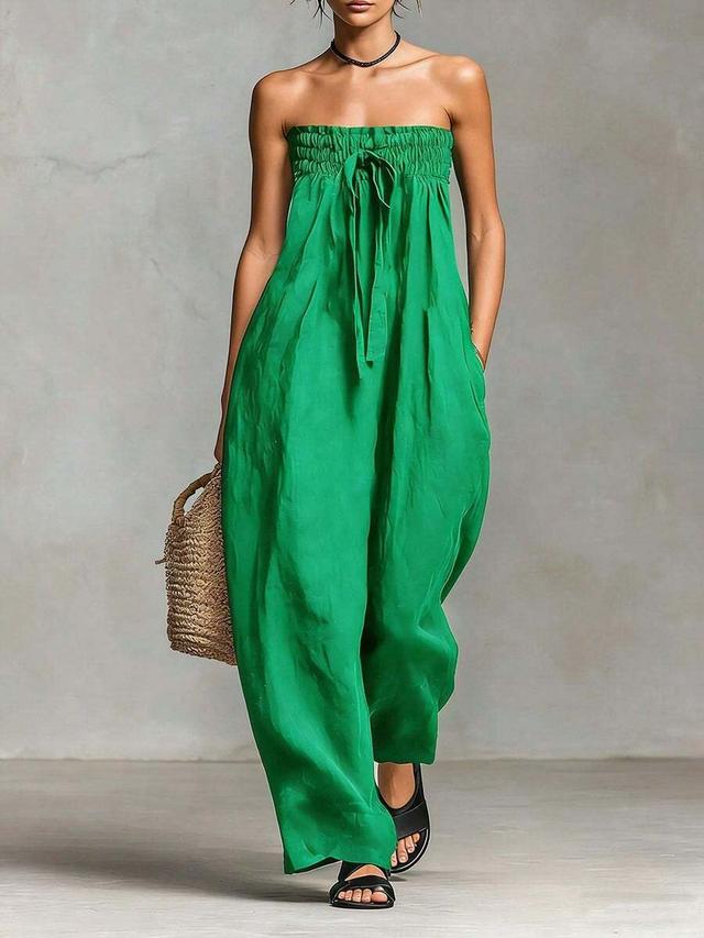 green vibrant green strapless smocked jumpsuit