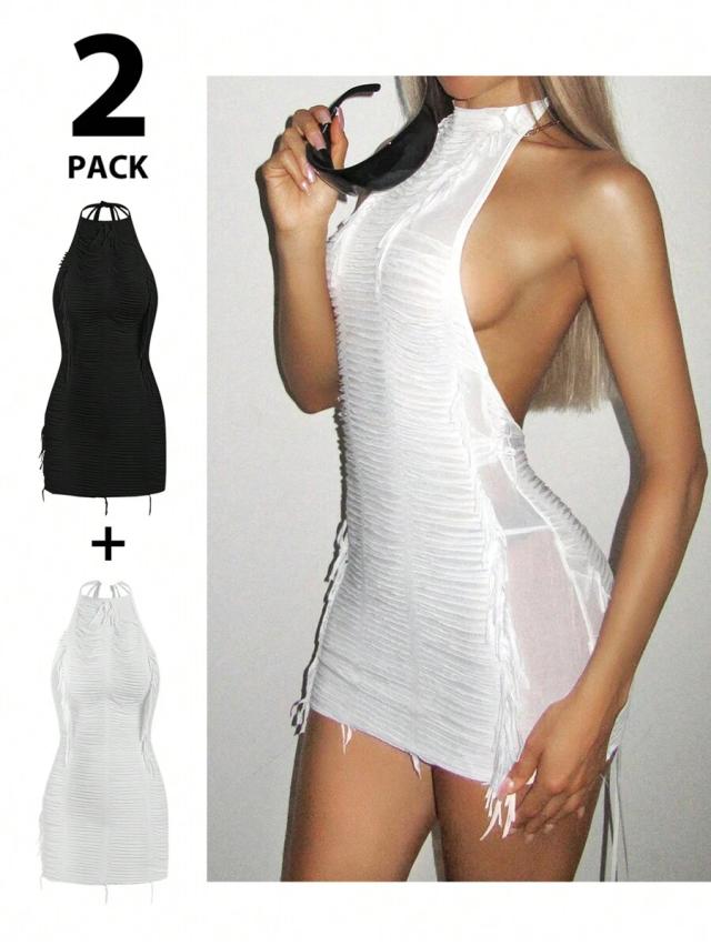 white two distressed fringe detail mini dresses in black and white