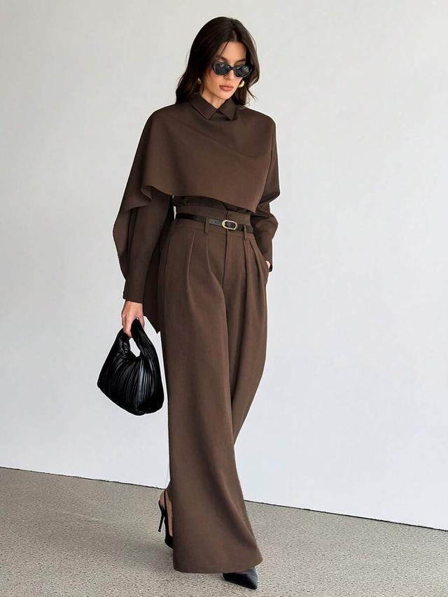 dark brown cape sleeve blazer and wide leg trousers
