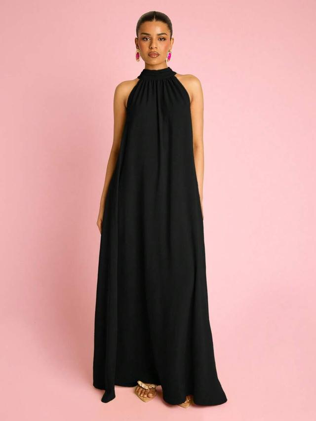 black halterneck flowing trapeze maxi dress