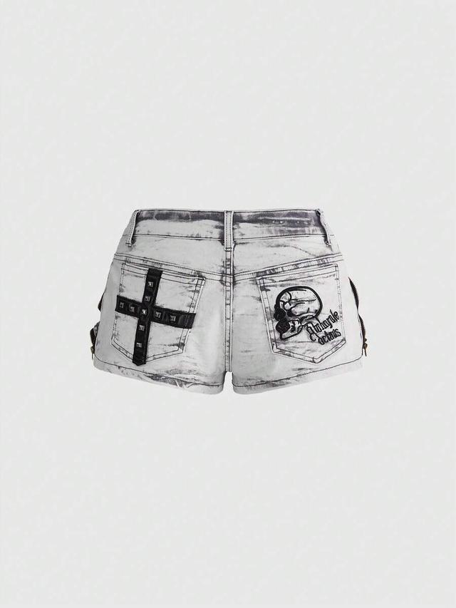 acid wash denim shorts with skull and cross applique