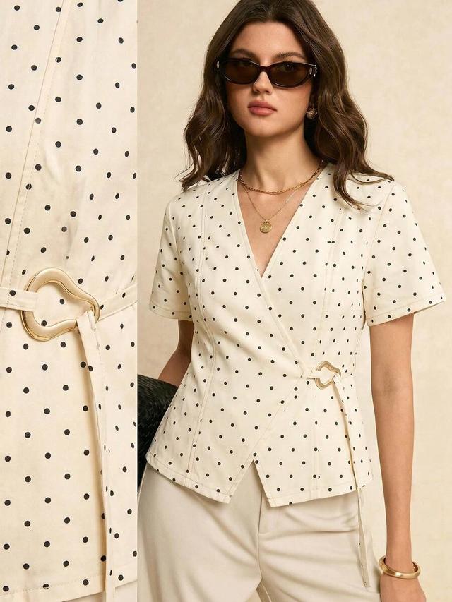 cream polka dot wrap blouse with side buckle