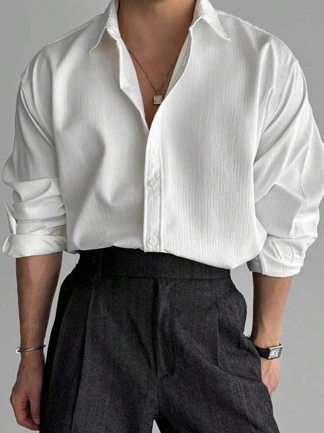 white textured long sleeve button-up shirt