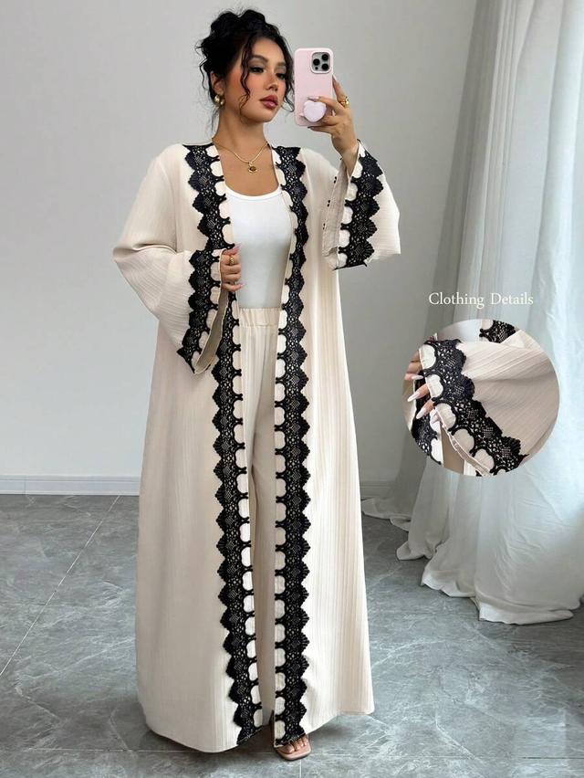 cream pleated open front jacket and trousers set