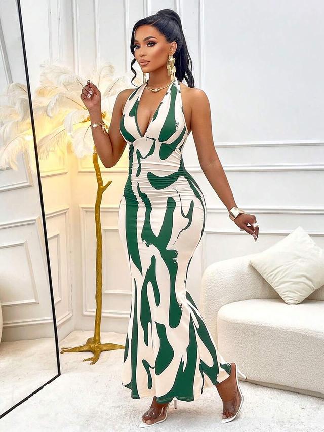 green and white abstract print halter maxi dress
