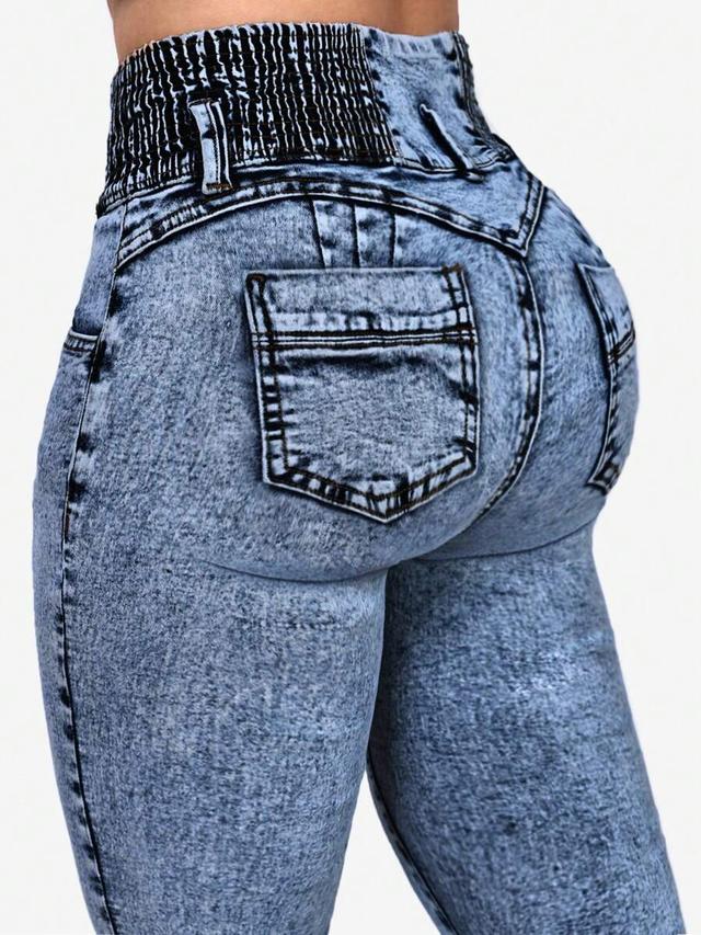 acid wash high-waisted denim jeans with smocked waistband