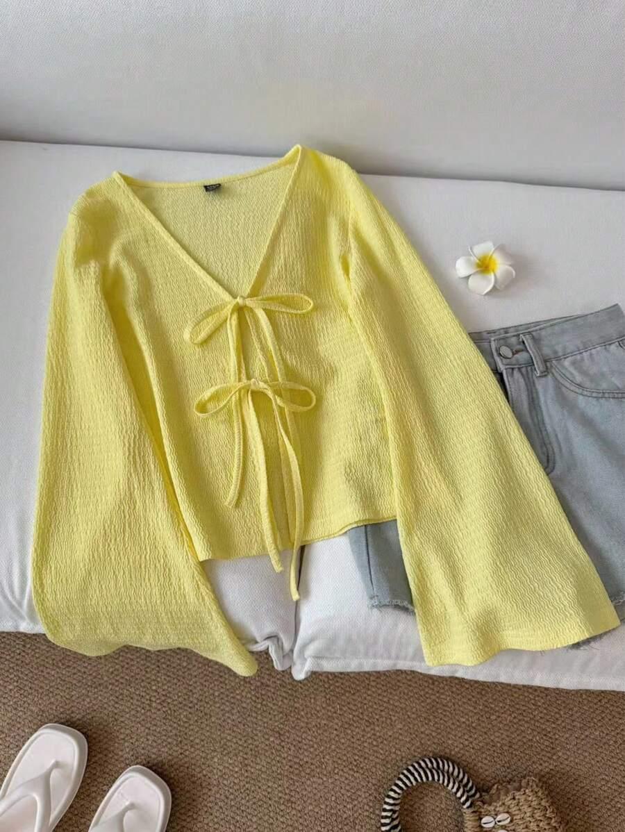 pale yellow v-neck tie front flare sleeve blouse