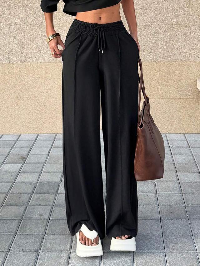 black loose-fit drawstring wide-leg trousers