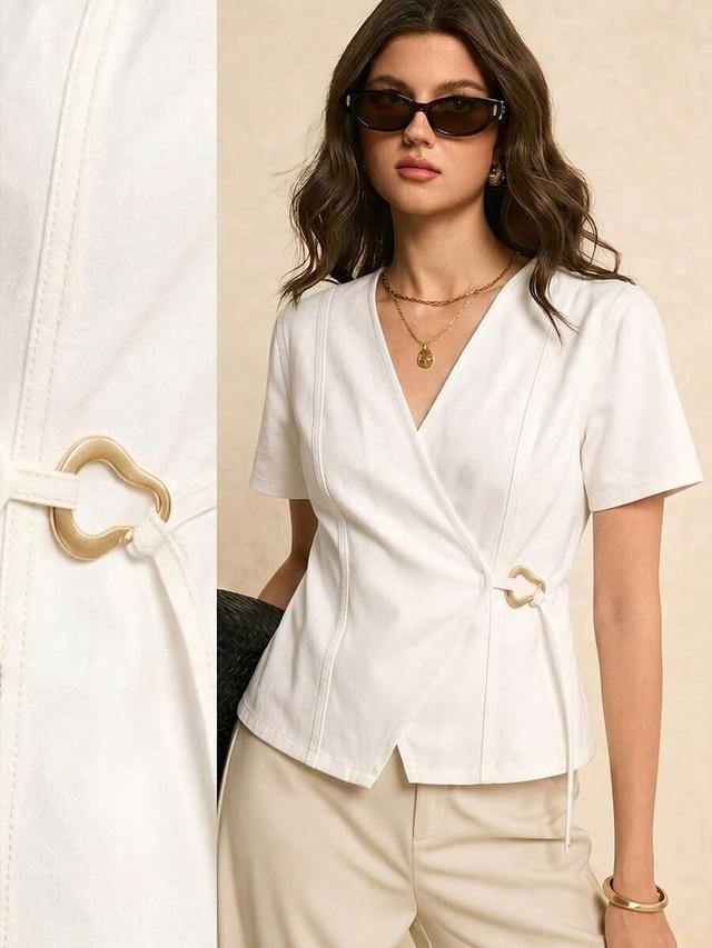 white cotton wrap blouse with side buckle detail