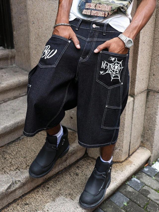 black baggy denim shorts with graphic print