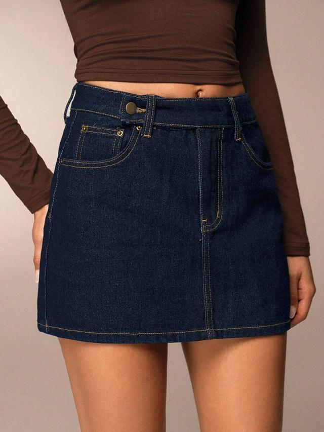 dark wash denim skirt with button detail