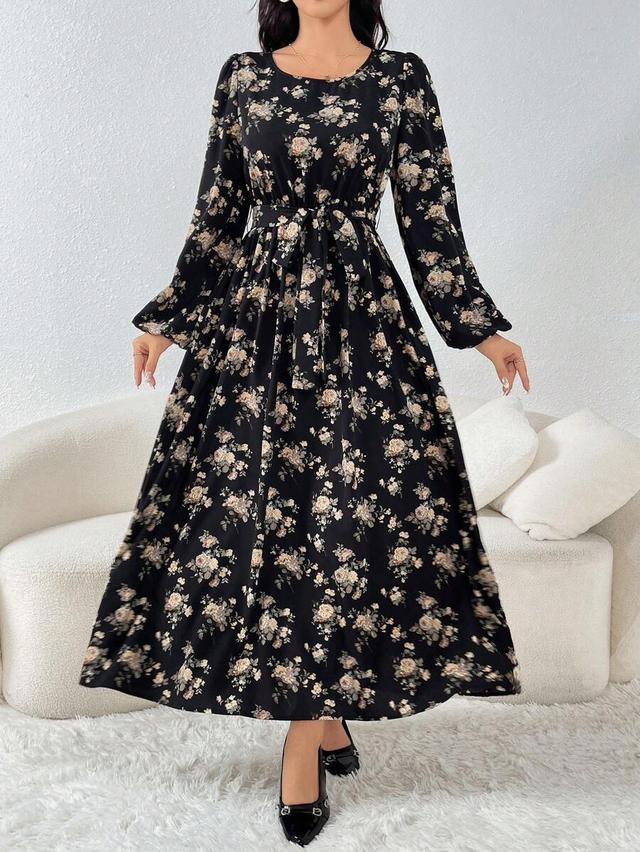 black and beige floral lantern sleeve cinched waist dress
