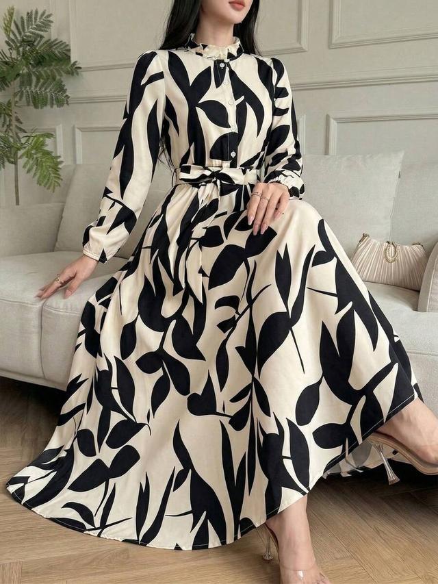 elegant black and white leaf print shirt dress
