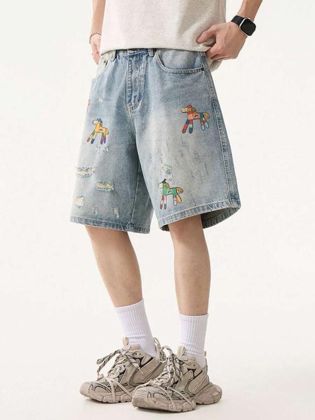 light-colored denim shorts with cartoon horse pattern