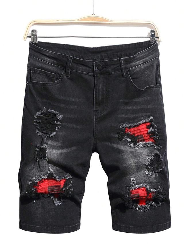 black washed denim ripped shorts with plaid patches
