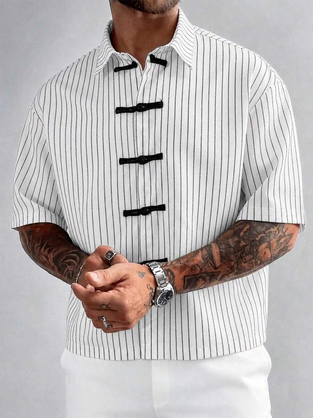white striped short sleeve shirt with frog buttons
