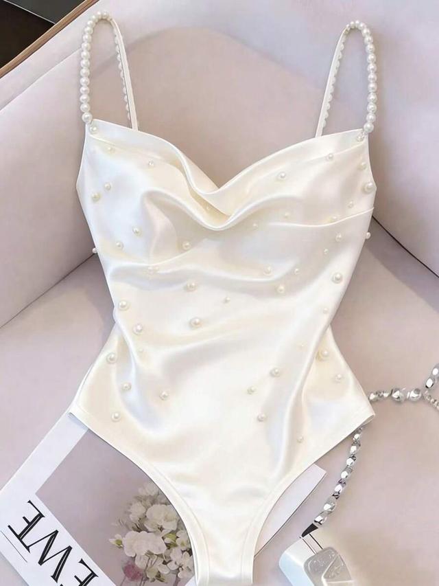 white satin draped neck bodysuit with faux pearl straps