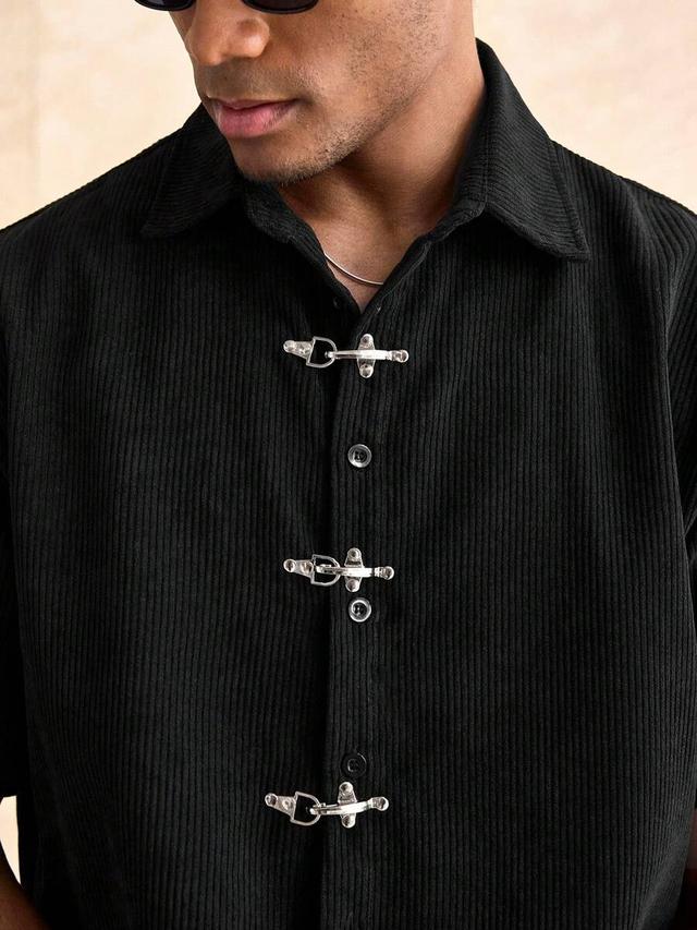 estavor black corduroy short sleeve shirt with metal clasps
