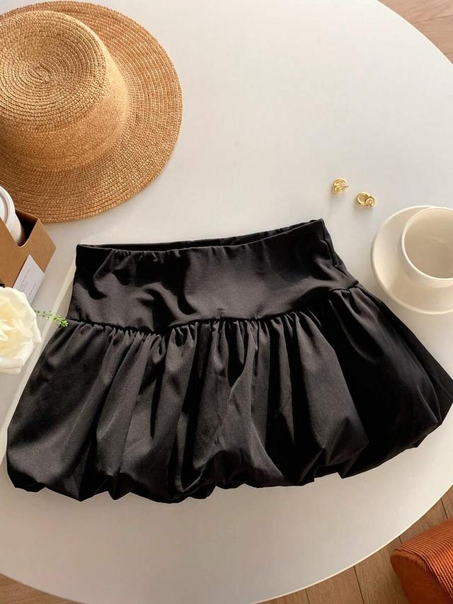 black low-waist mini bubble skirt