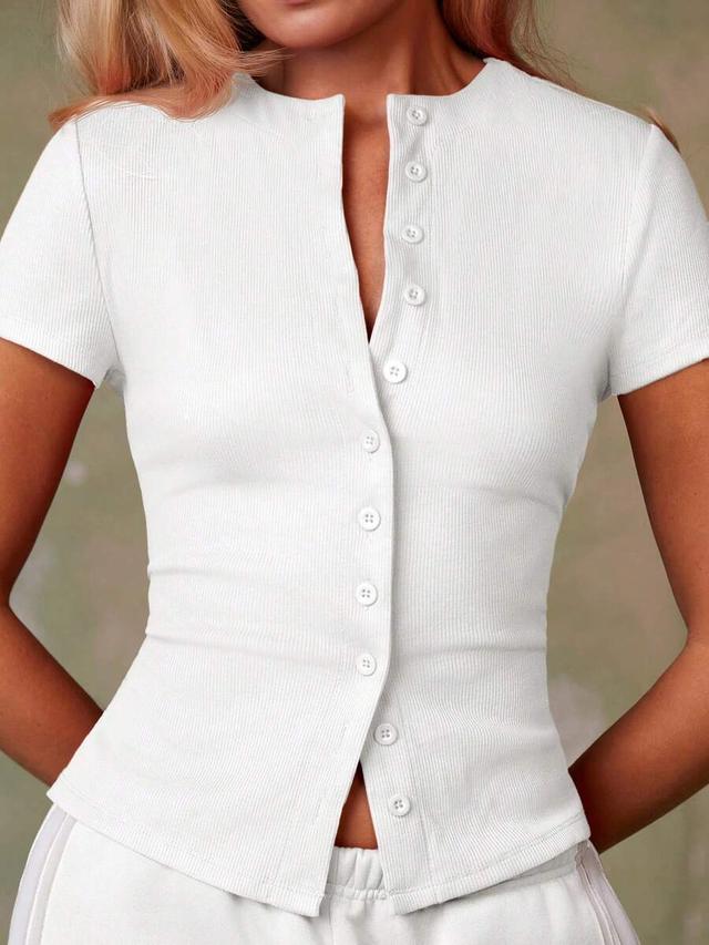 white ribbed short-sleeved button-down casual top
