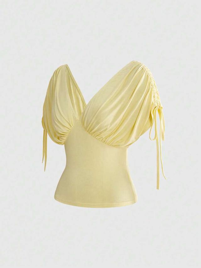 yellow ruched batwing sleeve slimming top