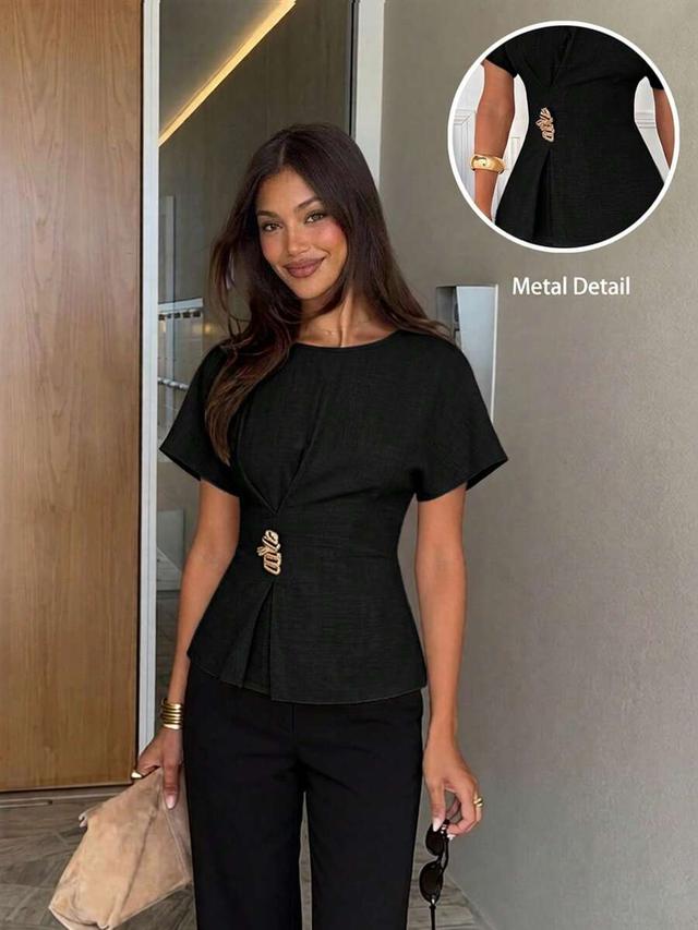 black linen blend waist-accented short sleeve blouse