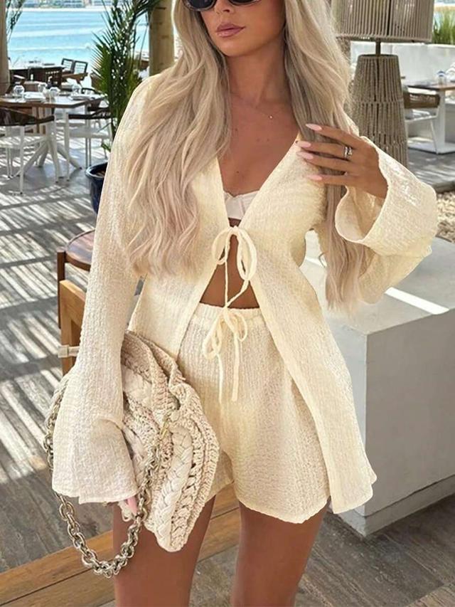 textured cream bell sleeve front tie top and shorts