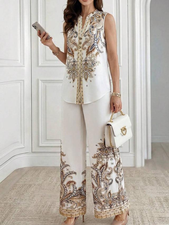 floral print sleeveless button-up shirt and wide leg pants