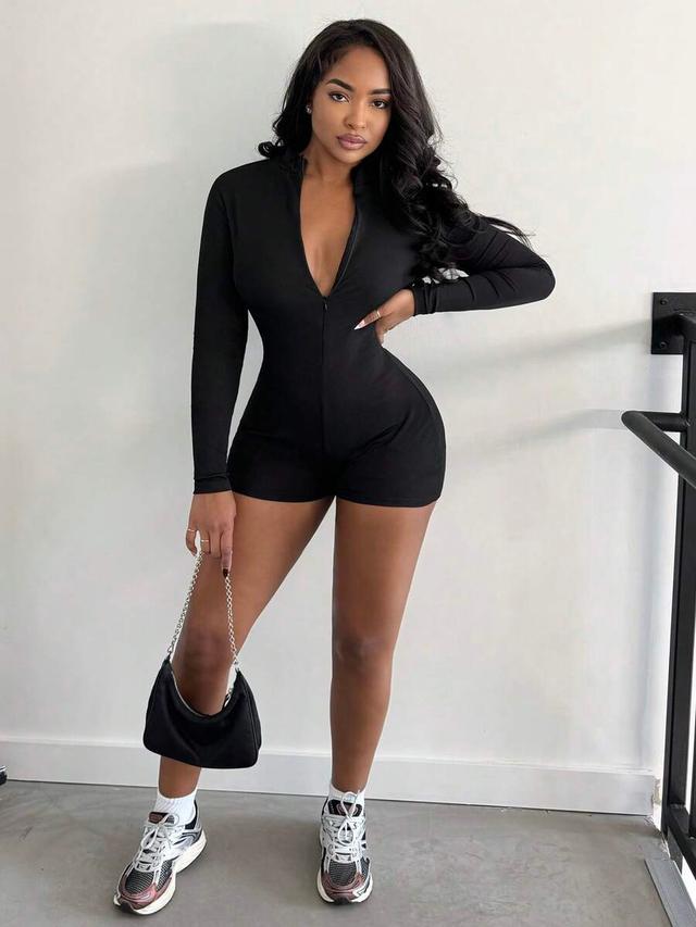 black long sleeve zip-front playsuit