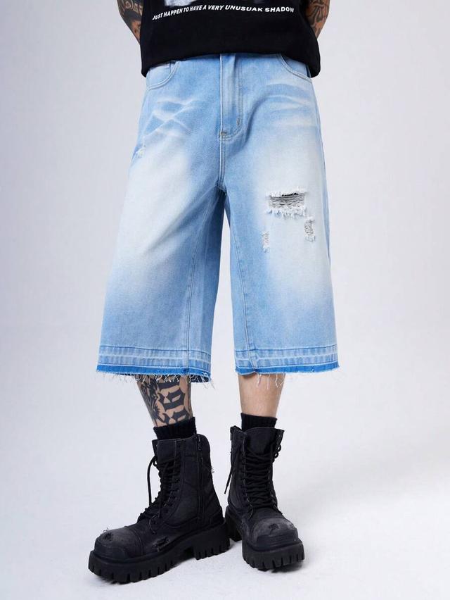 light blue ripped vintage denim shorts