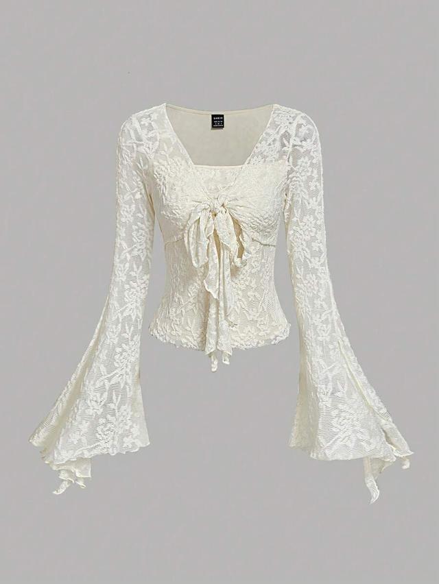 apricot floral lace front tie bell sleeve top