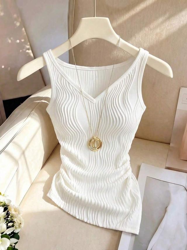 white sleeveless v-neck tank with wavy texture