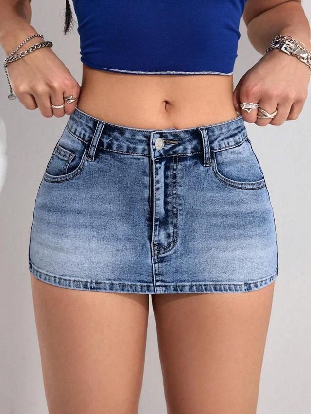 high-waisted medium wash denim mini skirt
