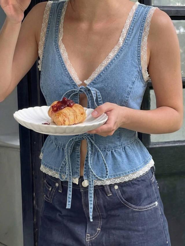 light blue denim lace trim peplum tie front top
