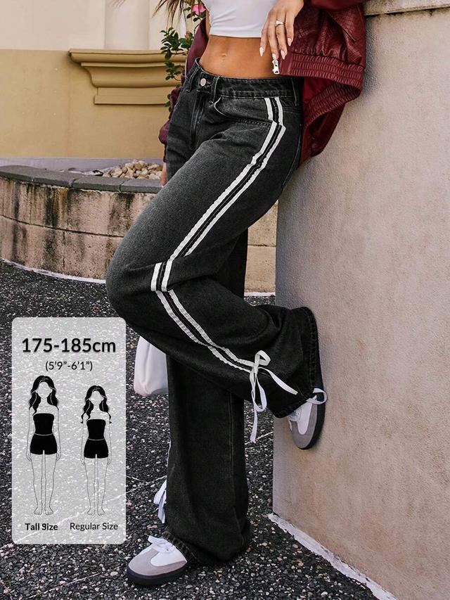 black denim straight leg jeans with side stripe and bow