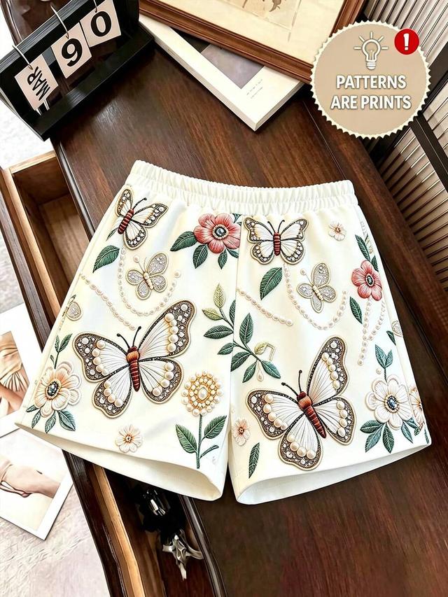 white butterfly and floral print elastic waist shorts